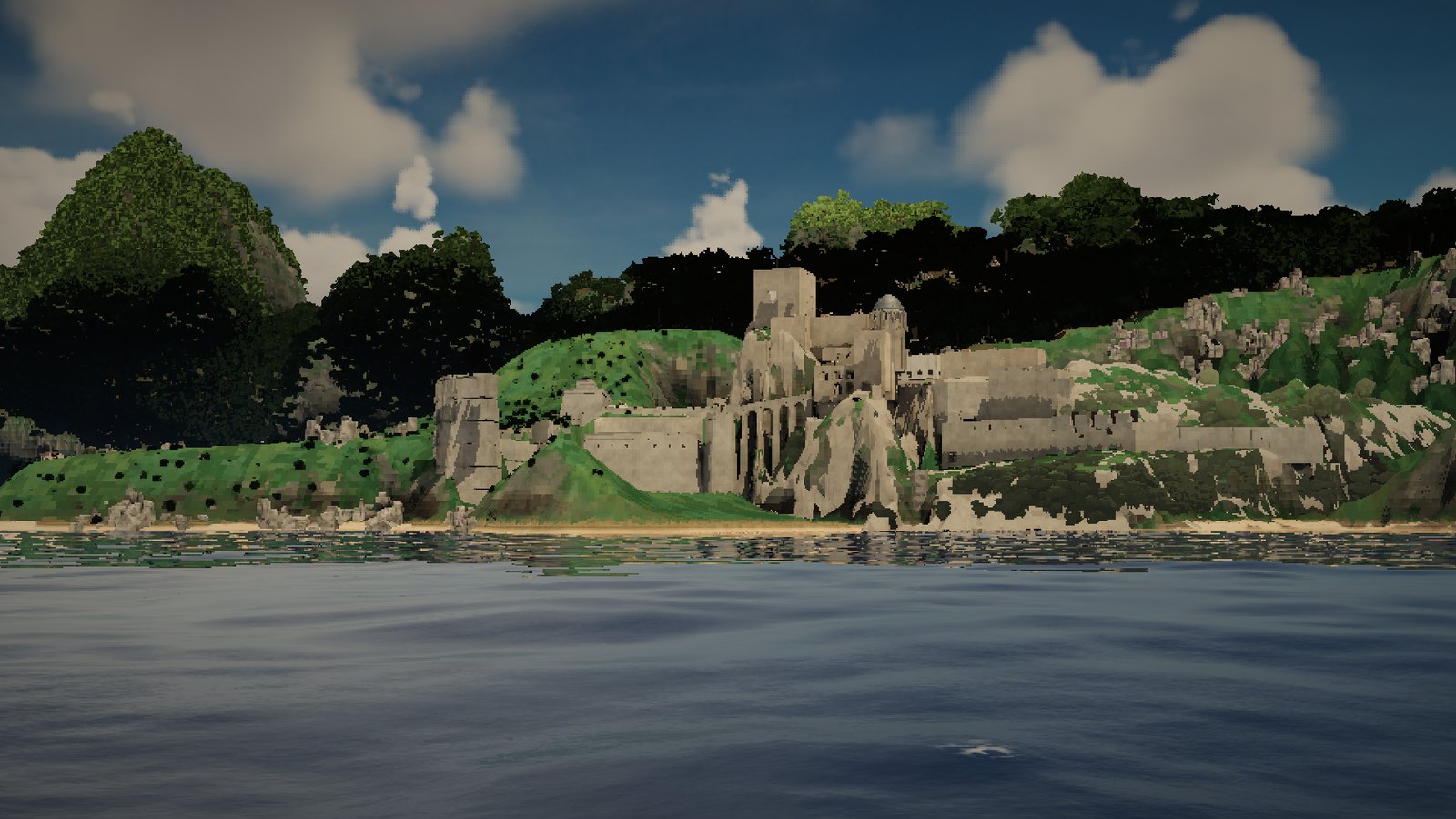 A stone fort above a green headland, seen from the sea